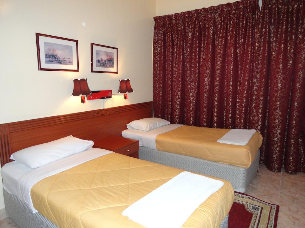 Lavender Hotel Apartments Dubái Habitación foto