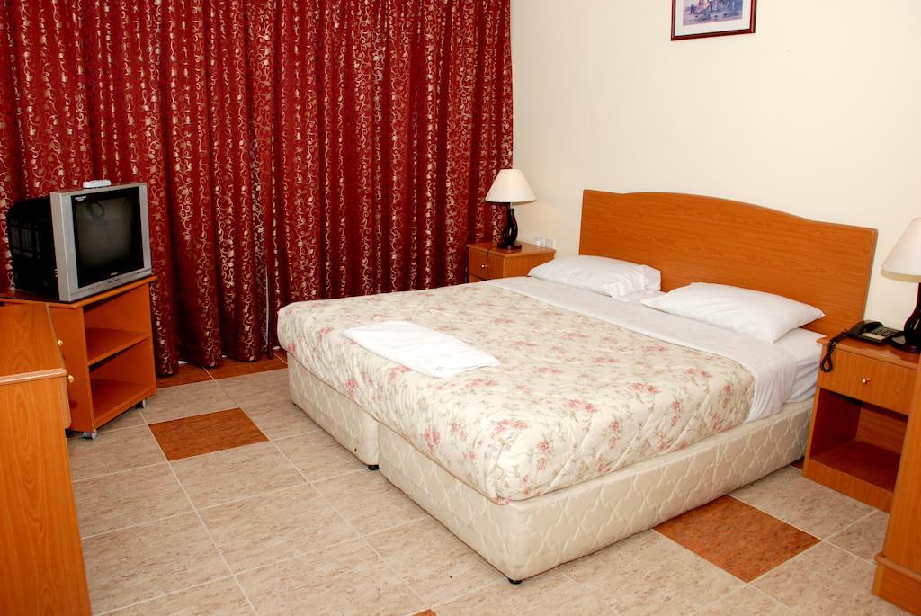 Lavender Hotel Apartments Dubái Habitación foto
