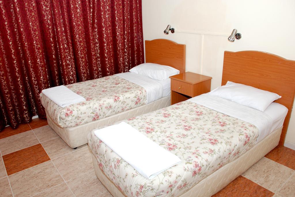 Lavender Hotel Apartments Dubái Habitación foto